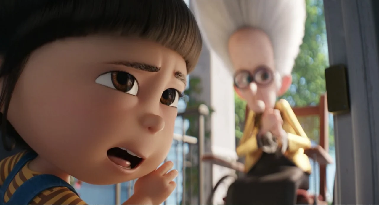 Despicable Me 4 (2024) movie still: closeup — A sunny residential porch features a young child in the foreground and an elderly woman. The child…