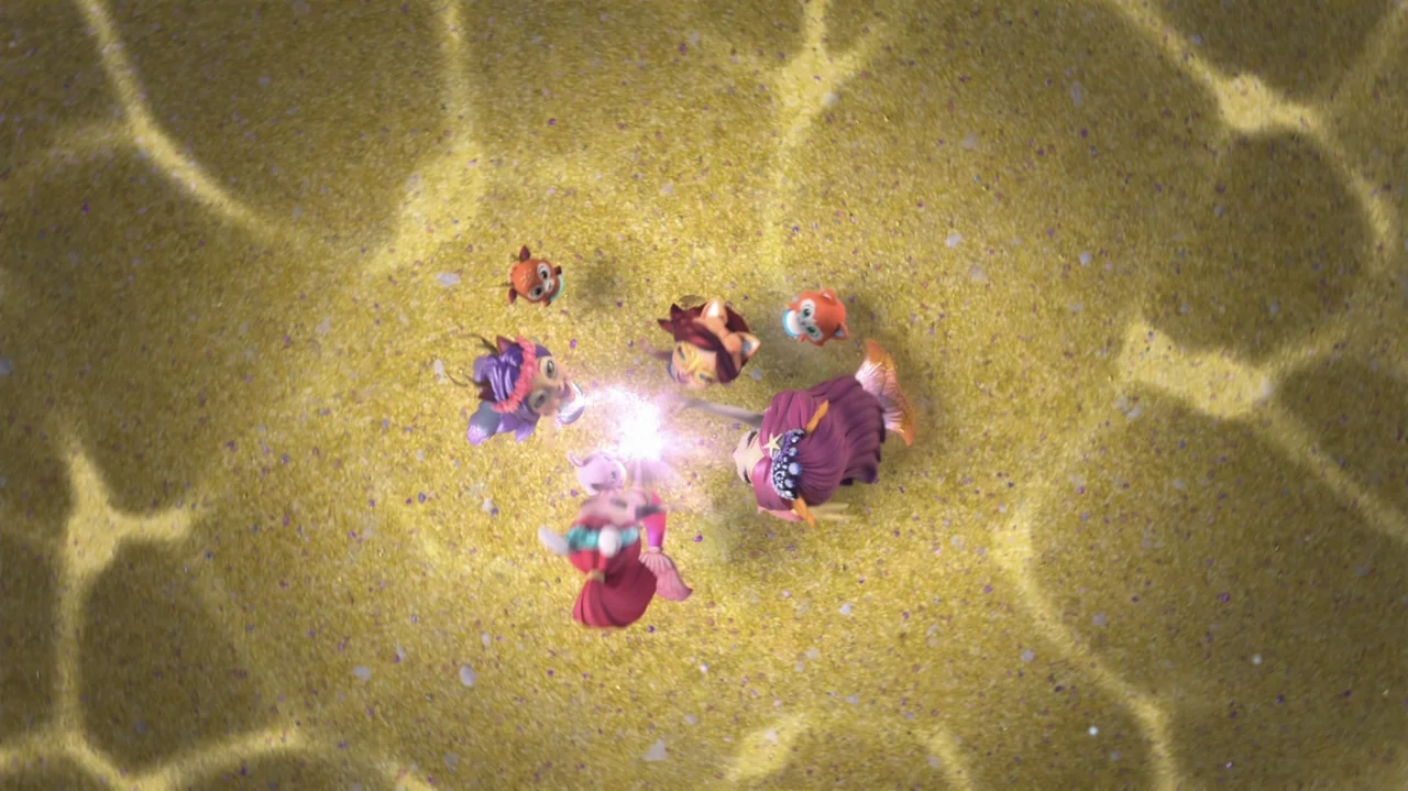 Enchantimals - Ocean Kingdom (2023) movie still: wide — A sandy ocean floor is illuminated by shimmering caustic light from the surface above. Five…
