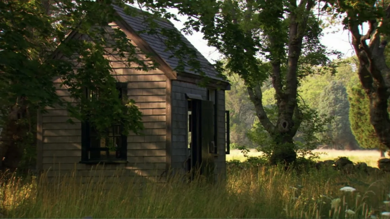 David McCullough: Painting with Words (2008) movie still: wide — A wooden shed with shingle siding sits in a clearing surrounded by tall grass.…