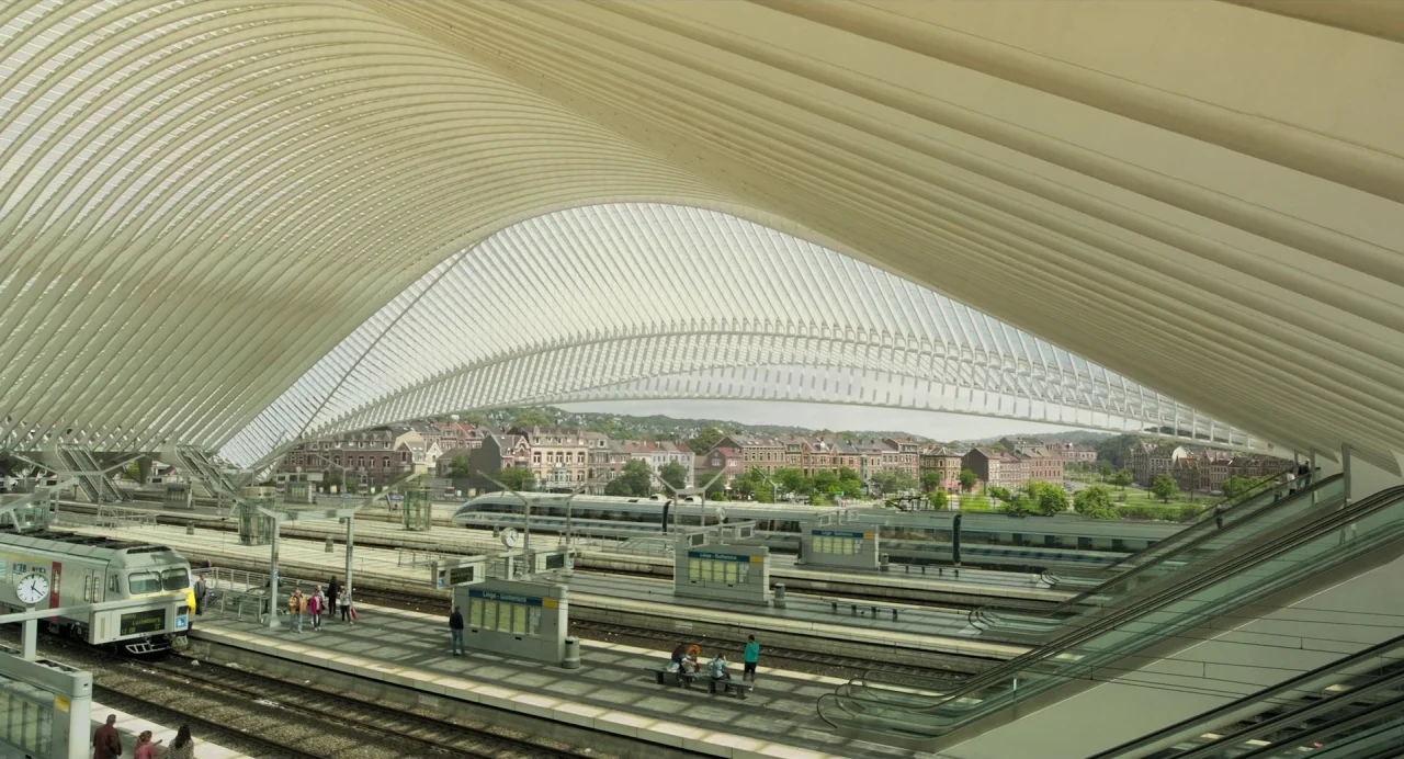 Gemini Man (2019) movie still: establishing — An architectural train terminal features a massive, curved steel and glass vaulted roof. High-speed…