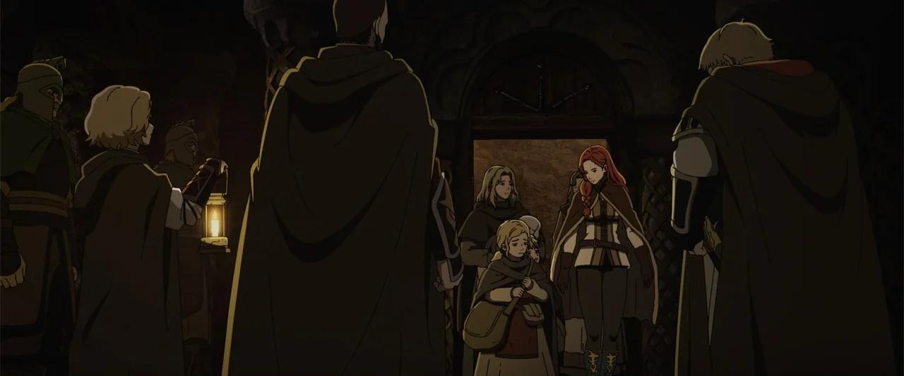 The Lord of the Rings: The War of the Rohirrim (2024) movie still: medium — A dark stone passageway with vaulted ceilings is illuminated by a…