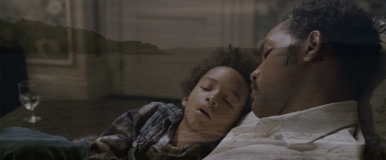The Pursuit of Happyness (2006) movie still: closeup — An interior bedroom features a double exposure effect layering a coastal landscape over…