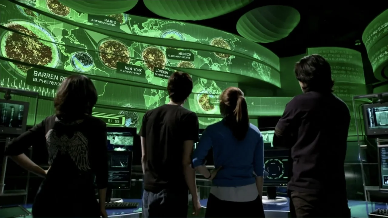 Ben 10: Race Against Time (2008) movie still: medium — A high-tech control room is filled with large, glowing green digital screens displaying maps.…