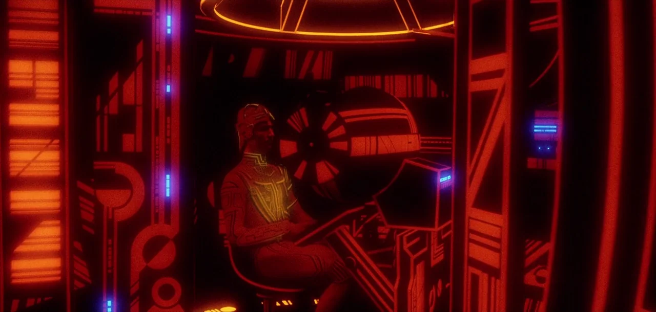 Tron (1982) movie still: medium — A futuristic digital cockpit features dark walls glowing with vibrant red circuit patterns. A man wearing a…