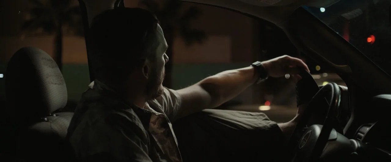 True Account: Breaking the Truce (Yakuza Bloody Chronicles 2) (2007) movie still: medium — The interior of a vehicle at night with the driver…