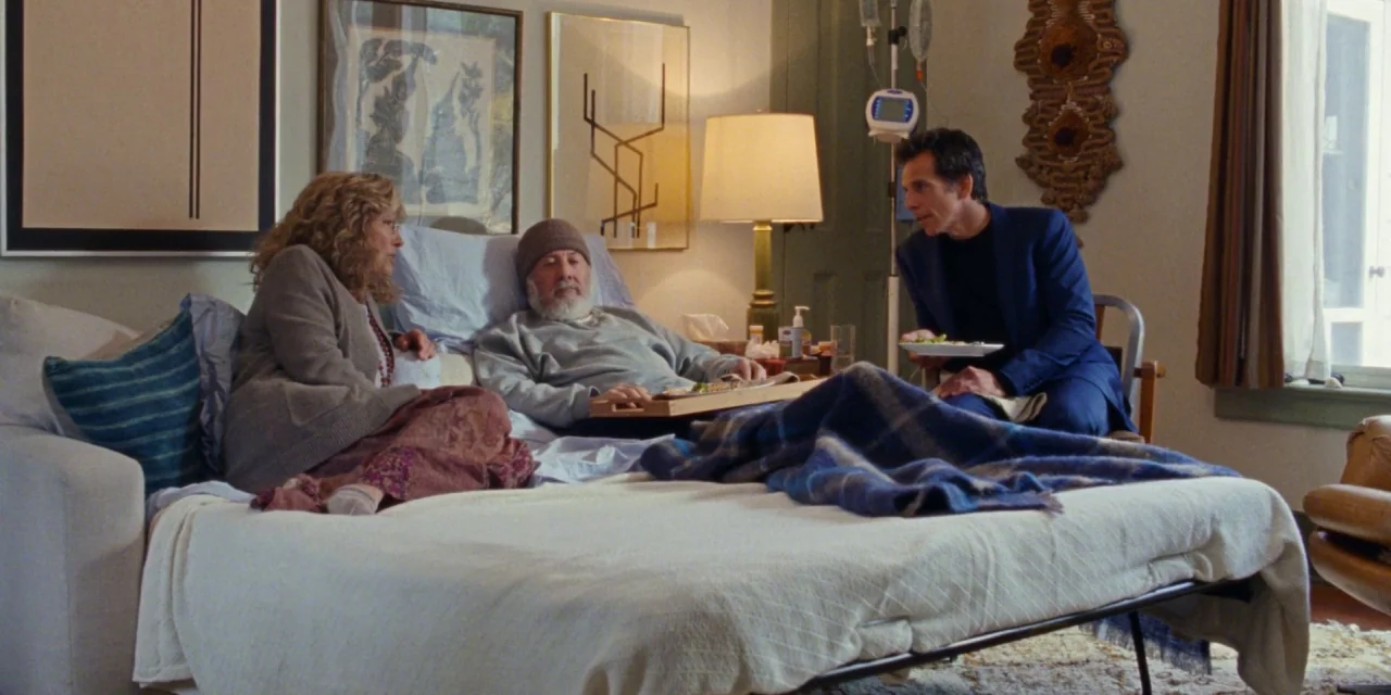 The Meyerowitz Stories (New and Selected) (2017) movie still: wide — A residential bedroom contains a fold-out bed with an elderly man resting under…