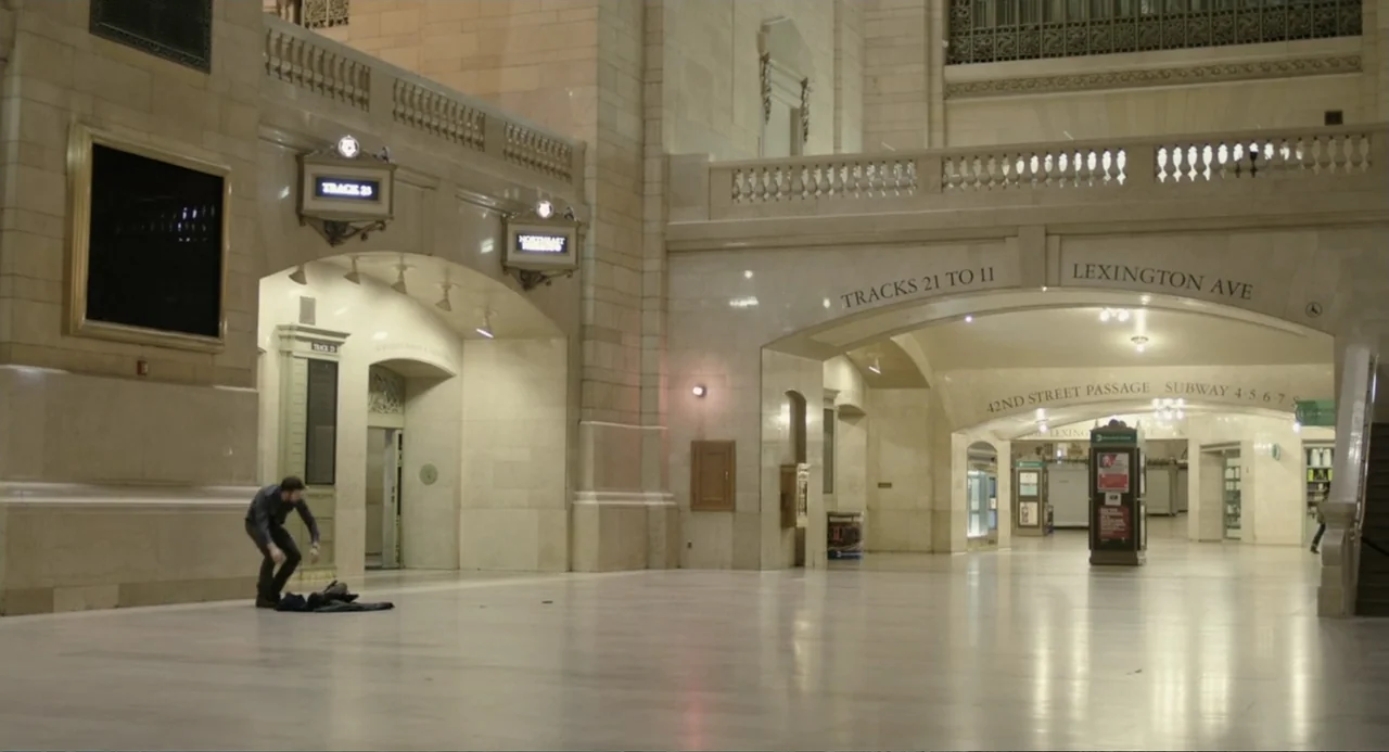 Before We Go (2014) movie still: wide — A vast, high-ceilinged stone transit hall features arched doorways and classic interior architectural…