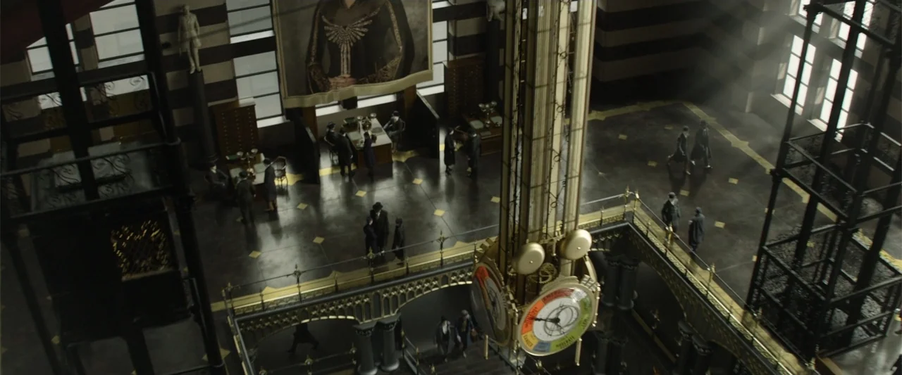 Fantastic Beasts and Where to Find Them (2016) movie still: establishing — A grand, multi-level hall features dark stone floors and a central clock…