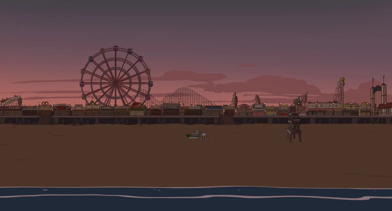 Robot Dreams (2023) movie still: establishing — A wide view of an amusement park boardwalk overlooking a vast sandy beach at sunset. A lone…