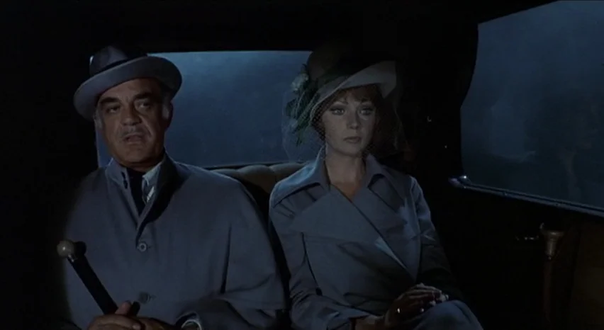 Lisa and The Devil (1973) movie still: medium — The interior of a vintage automobile at night with dark, blurred landscapes passing outside. An…