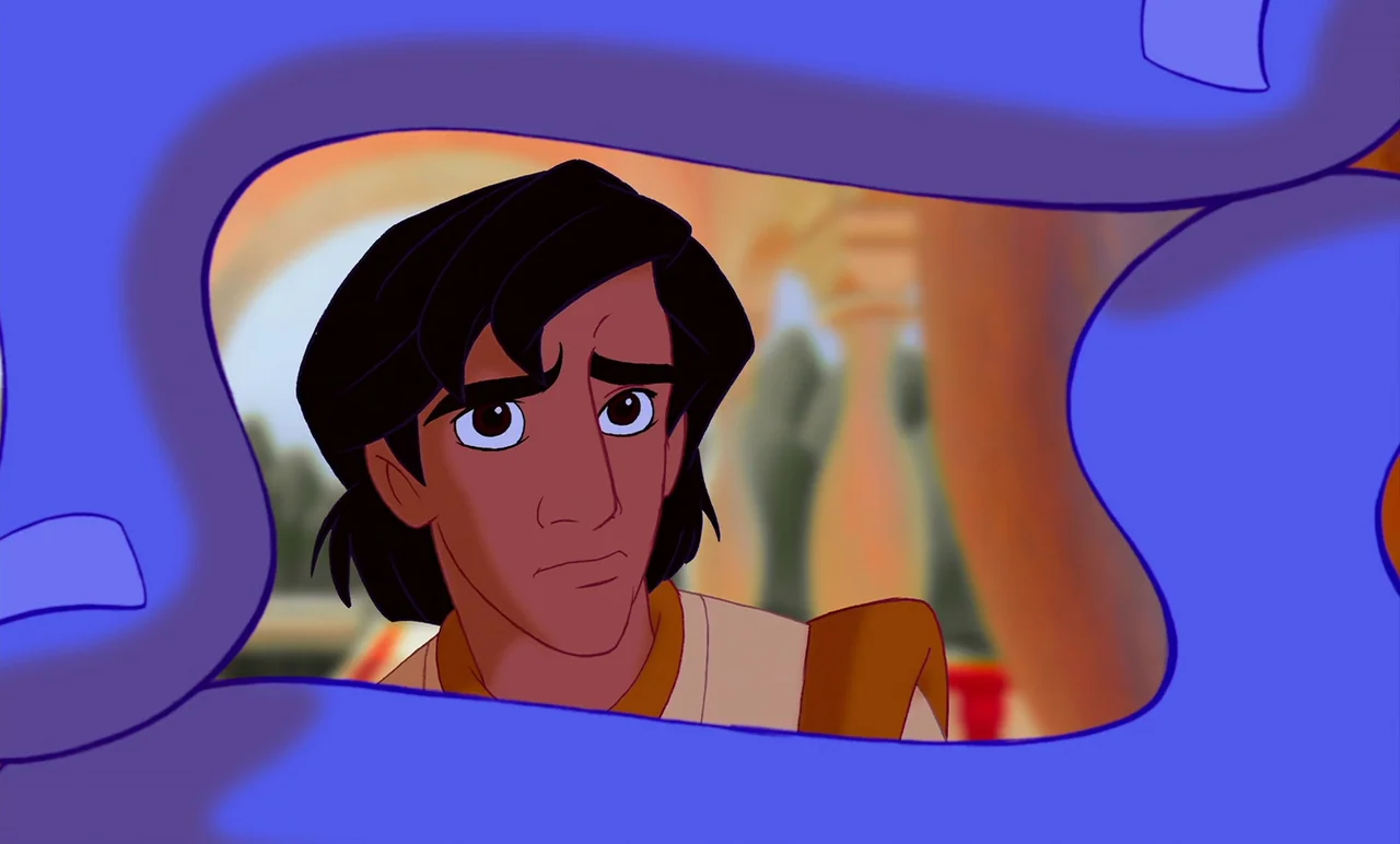 Aladdin (1992) movie still: closeup — A cartoon man peers through a blue opening within an architectural courtyard. He has short dark hair and wears…