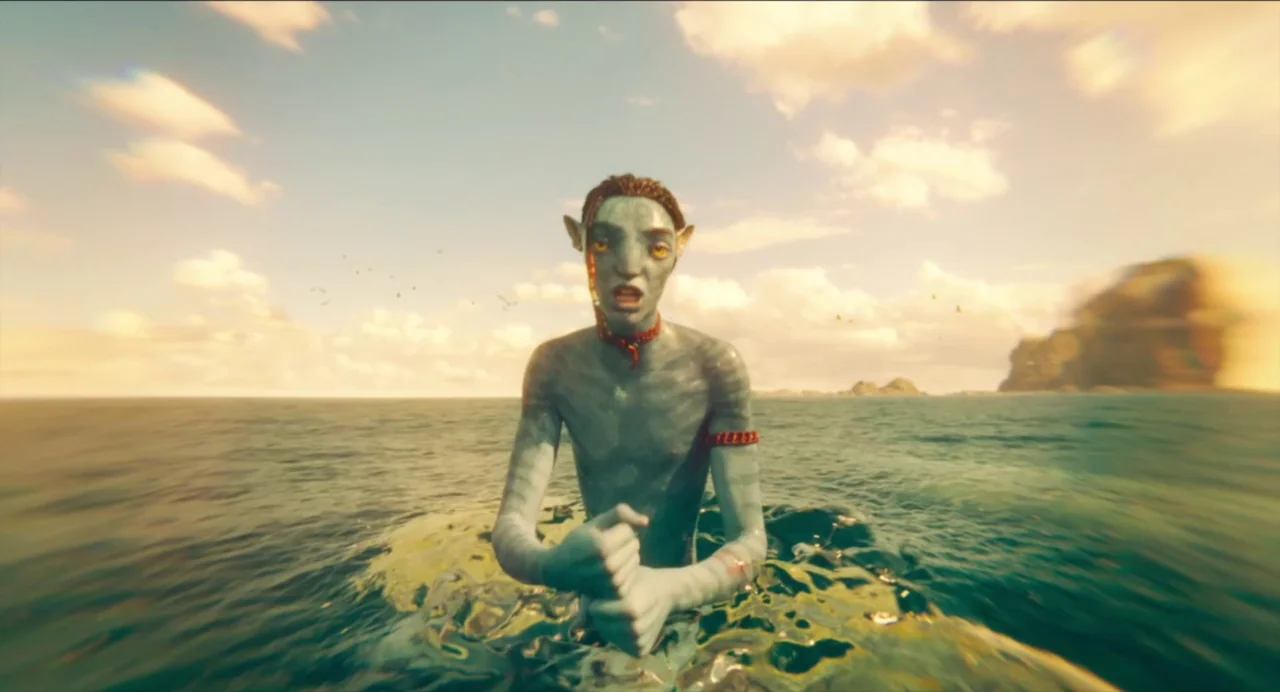 Avatar: The Way of Water (2022) movie still: medium — A blue-skinned alien humanoid floats in the middle of a vast, calm ocean expanse. The subject…