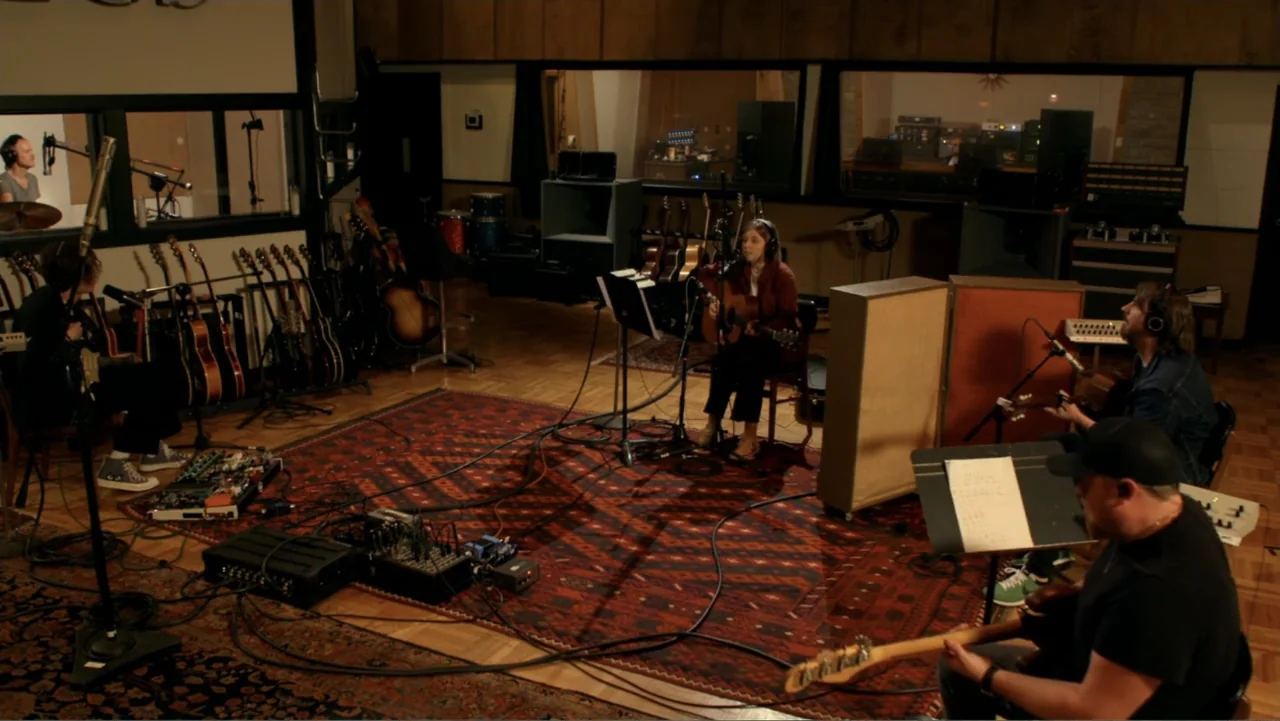 The Day the Music Died: The Story of Don McLean's "American Pie" (2022) movie still: wide — A spacious recording studio with wood paneling and a…