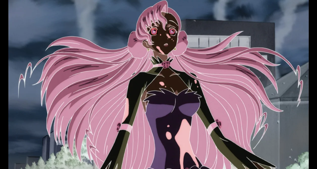 Code Geass: Lelouch of the Rebellion III - Glorification (2018) movie still: medium — An outdoor urban area with overcast sky and a gray building in…