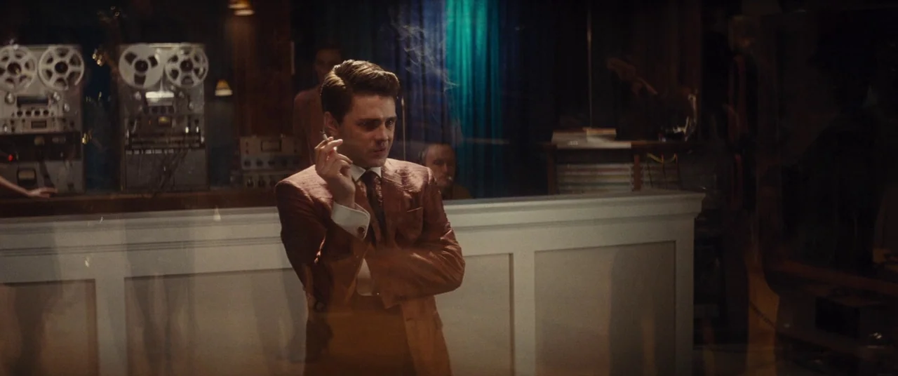 Bad Times at the El Royale (2018) movie still: medium — A dimly lit recording studio features vintage reel-to-reel tape machines and a wooden…