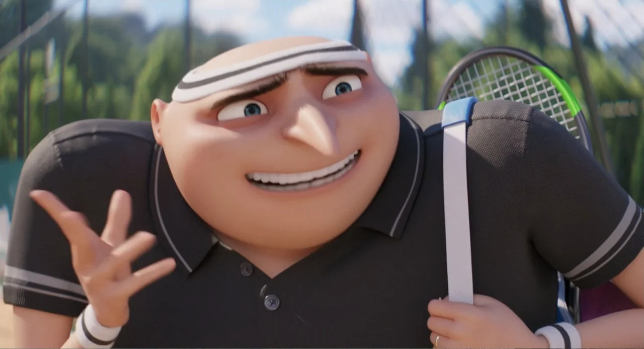 Despicable Me 4 (2024) movie still: closeup — A bright outdoor tennis court with blurred green fencing in the background. A bald man with a large…