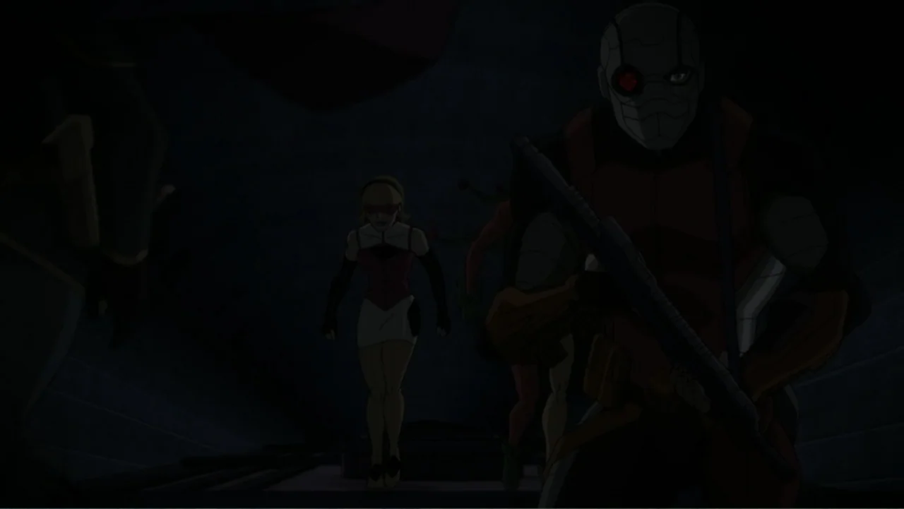 Suicide Squad: Hell to Pay (2018) movie still: medium — A dark, narrow industrial passageway is dimly lit with minimal, high-contrast light sources.…