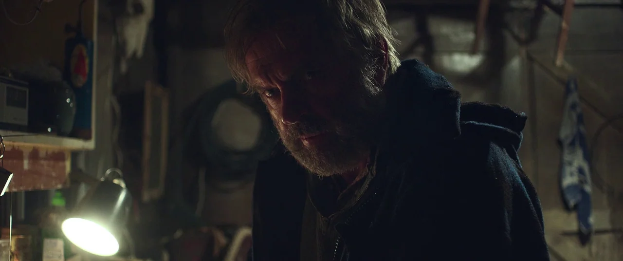 Hunt for the Wilderpeople (2016) movie still: medium — A cluttered workshop contains shelves filled with assorted tools and containers in deep…
