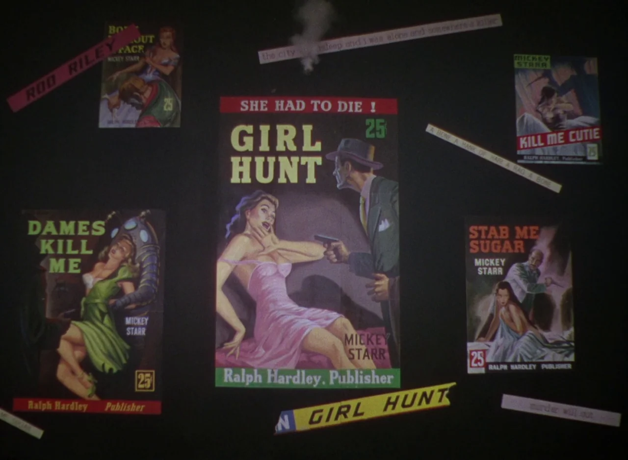 The Band Wagon (1953) movie still: establishing — A dark wall is decorated with multiple vintage pulp paperback covers and text strips. The posters…