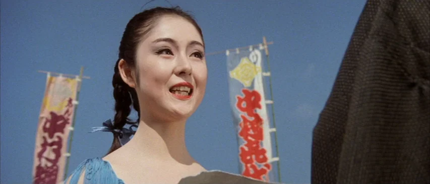 The Horrors of Malformed Men (1969) movie still: medium — An outdoor area features vertical fabric banners with Japanese characters against a clear…