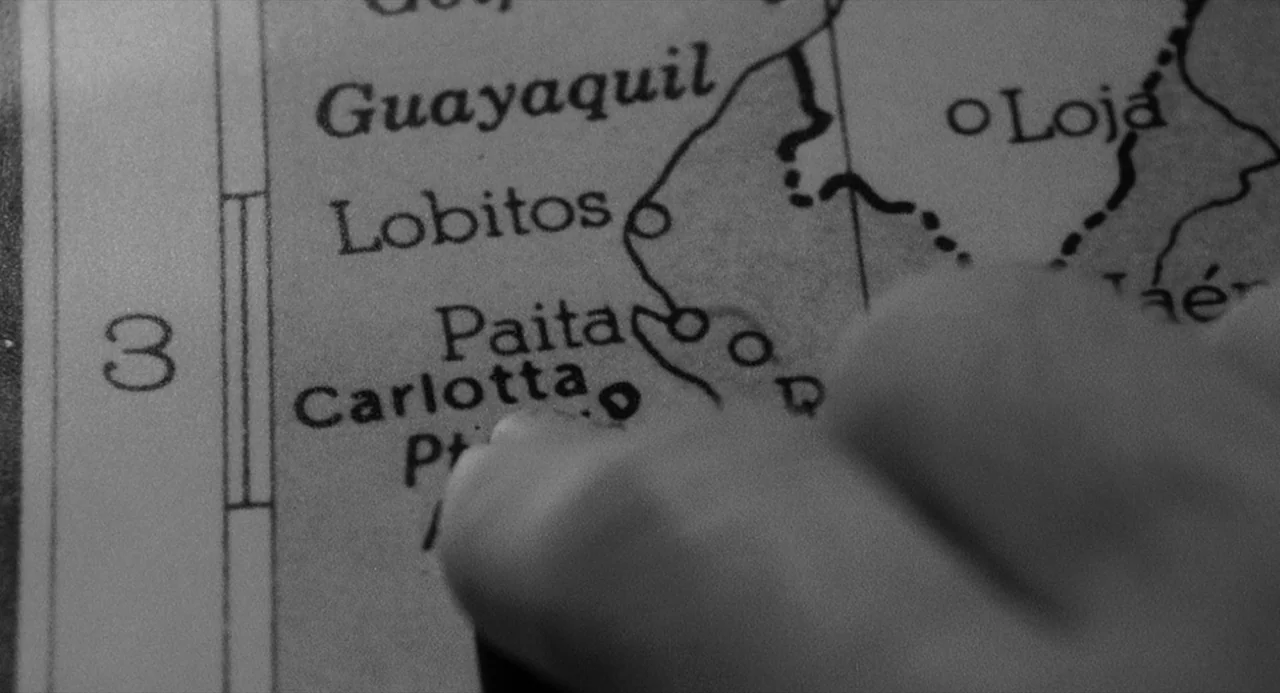 Dead Men Don’t Wear Plaid (1982) movie still: closeup — A close-up view of a printed geographical map showing South American coastal regions. A…
