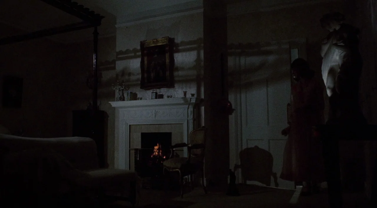 The Iguana with the Tongue of Fire (1971) movie still: wide — A dark, wood-paneled room features a fireplace with a framed painting above the…