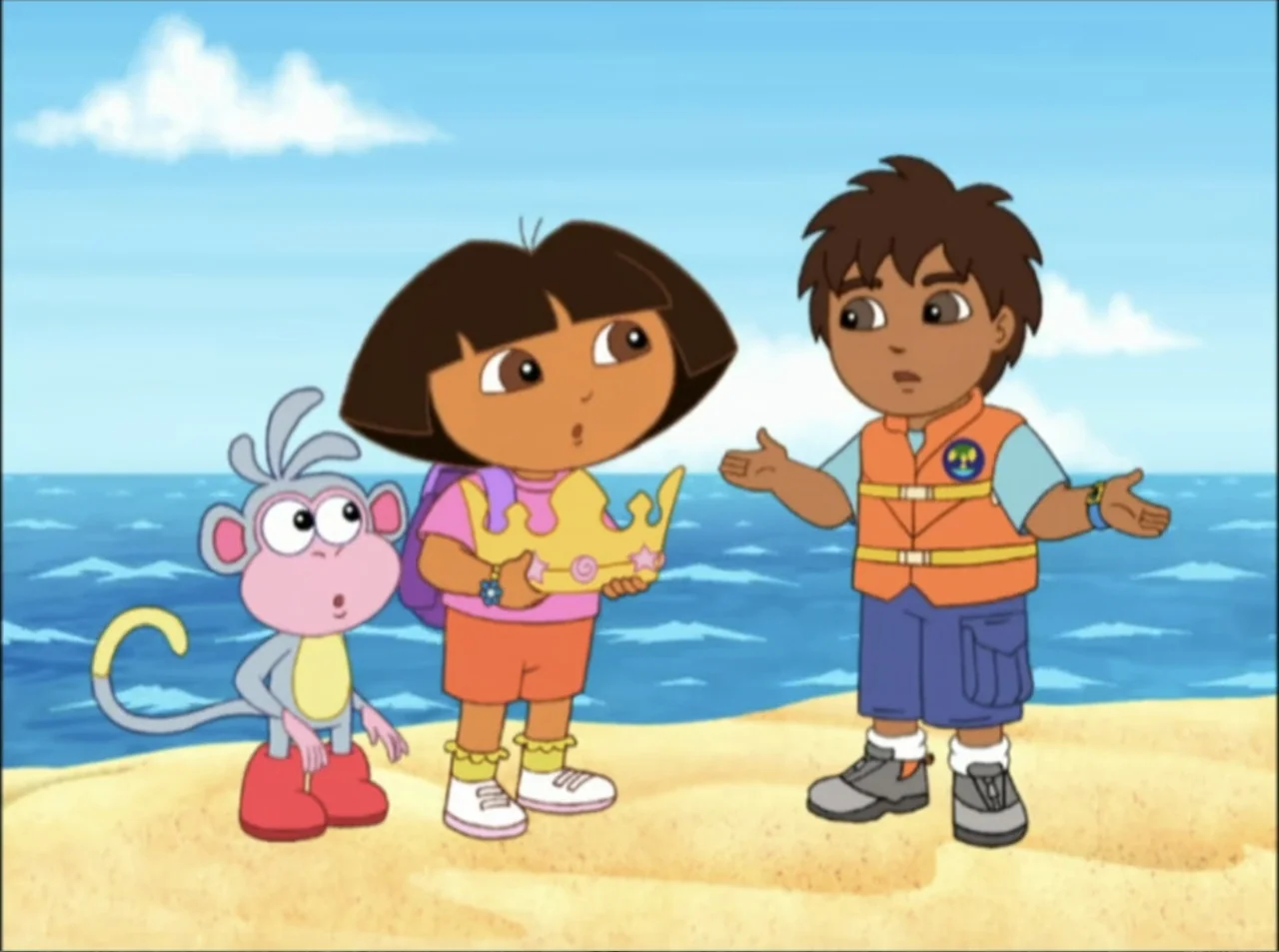 Dora the Explorer: Mermaid Adventures (2025) movie still: medium — A sunny beach with yellow sand and blue water under a clear sky. A young girl…