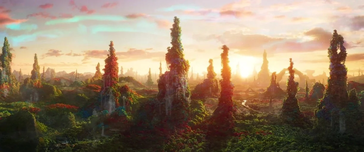 Guardians of the Galaxy Vol. 2 (2017) movie still: establishing — A vast alien landscape features towering, moss-covered rock pillars rising above…