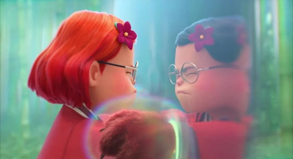 Turning Red (2022) movie still: medium — A teenage girl with bright red hair stares at her reflection in a mirror. She has a stern, focused…
