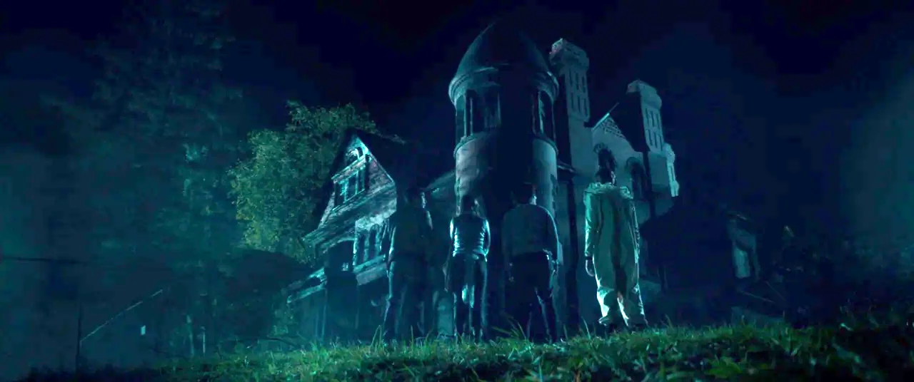 Scary Stories to Tell in the Dark (2019) movie still: wide — A dilapidated Victorian-style house stands against a dark, night sky filled with…