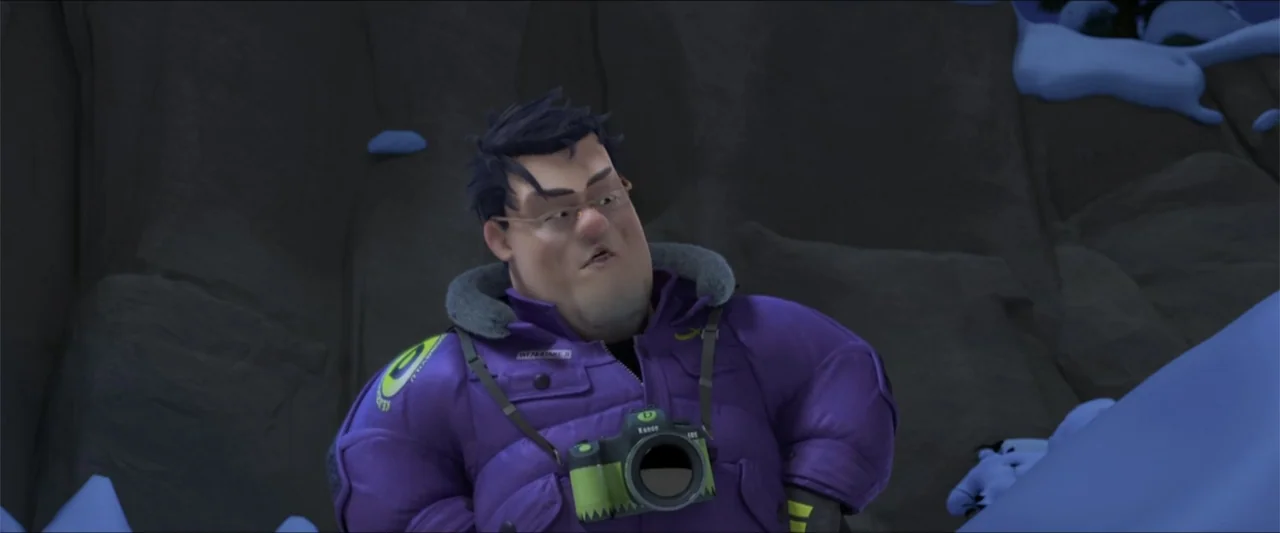 Boonie Bears: A Mystical Winter (2015) movie still: medium — A man stands against a gray rocky cliff face with patches of blue snow. He wears a…