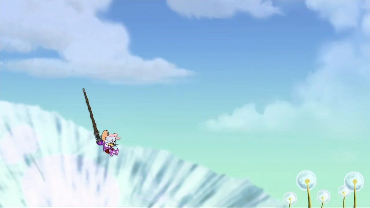 Tom and Jerry & The Wizard of Oz (2011) movie still: wide — A cartoon mouse flies through a bright blue sky above a green meadow. The mouse wears…
