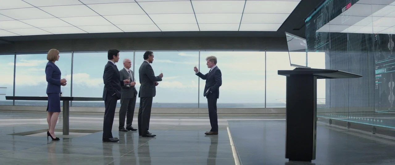 Captain America: The Winter Soldier (2014) movie still: wide — A modern, minimalist office space with floor-to-ceiling windows overlooking a distant…