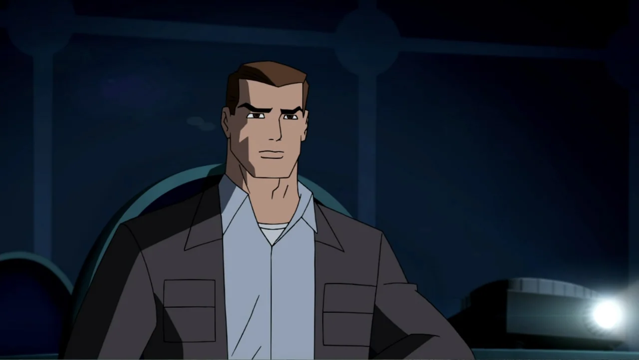 Justice League: The New Frontier (2008) movie still: medium — A dark, dimly lit office interior features geometric patterns on the wall panels…