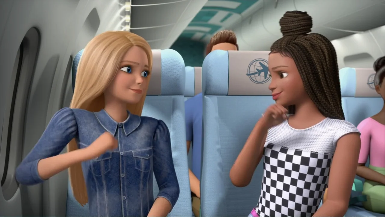 Barbie: Big City, Big Dreams (2021) movie still: medium — Two young women sit in light blue airplane seats on a commercial passenger aircraft. They…
