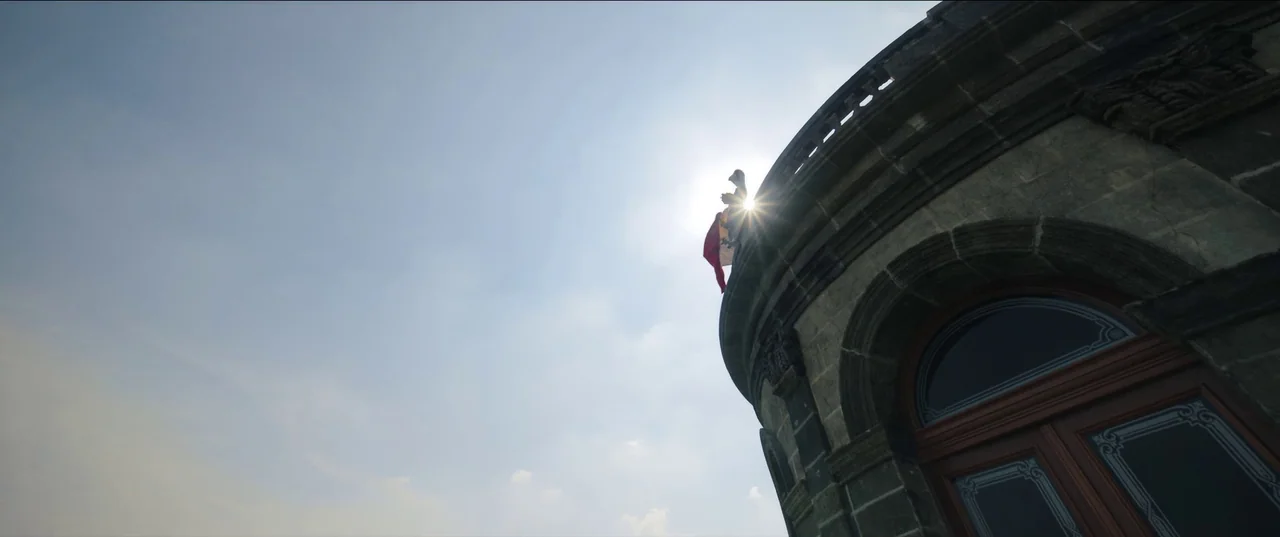 Bardo: False Chronicle of a Handful of Truths (2022) movie still: wide — A stone curved tower architecture rises against a bright blue sky with…