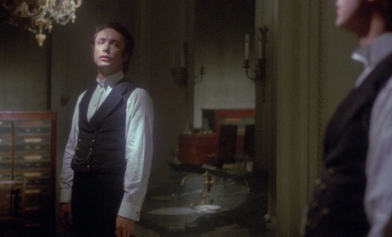 The Strange Case of Dr. Jekyll and Miss Osbourne (1981) movie still: medium — An ornate interior room with dark wood furniture and wall sconces…
