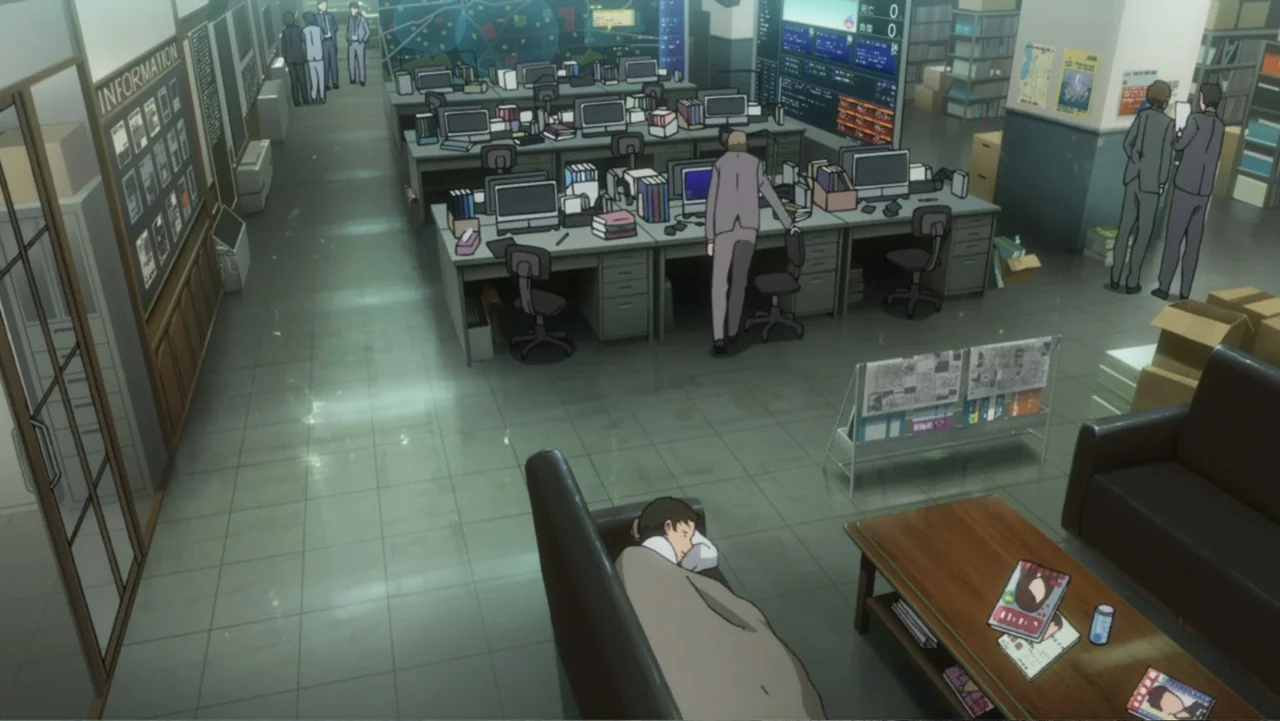 Ghost in the Shell: Arise - Border 1: Ghost Pain (2013) movie still: wide — An open-plan administrative office features rows of desks with computers…