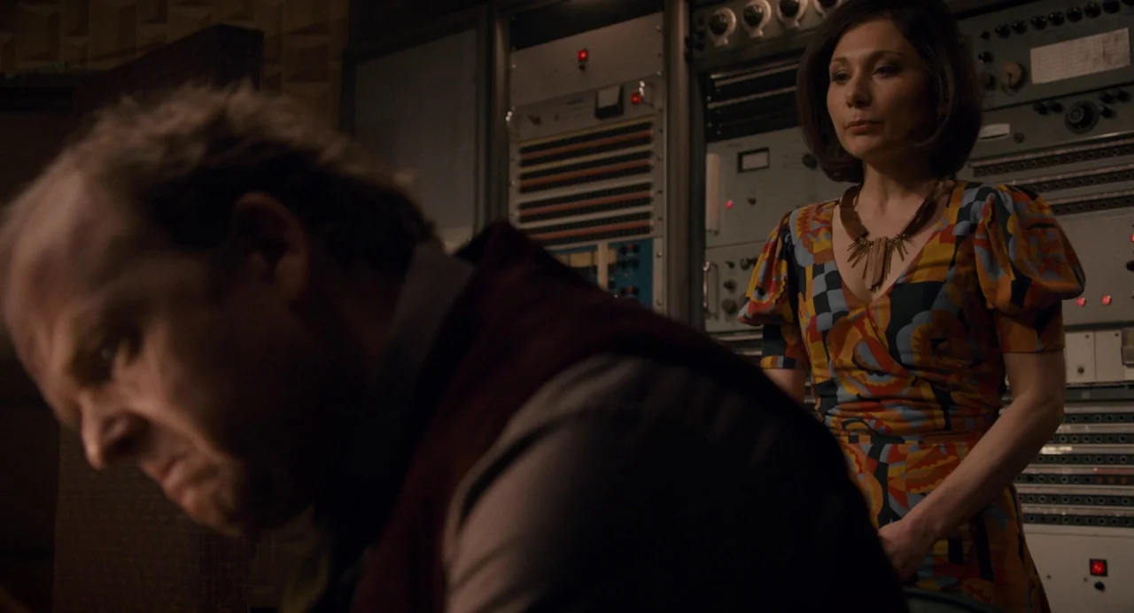 Berberian Sound Studio (2012) movie still: medium — A dimly lit room filled with vintage analog computing equipment and rack-mounted server…