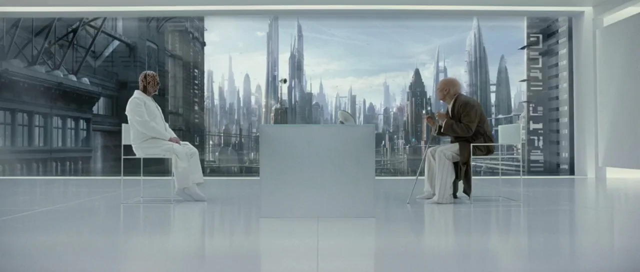 Mr. Nobody (2009) movie still: wide — A minimalist, white high-tech room looks out over a massive, dense futuristic cityscape. Two men sit on…