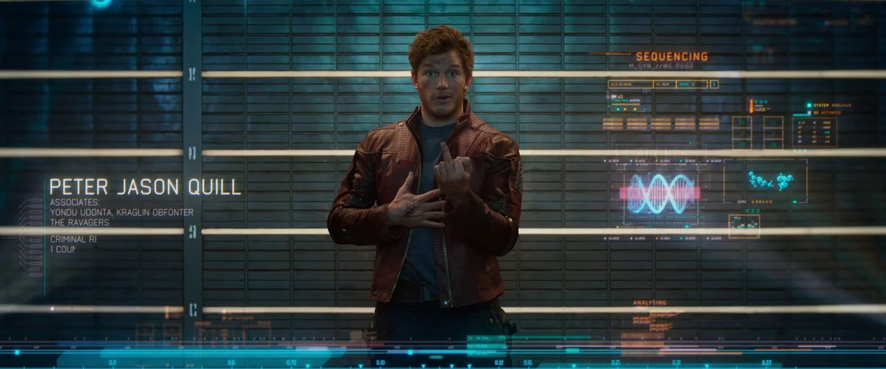 Guardians of the Galaxy (2014) movie still: medium — A dark space with horizontal height measurement lines and floating holographic data panels. A…