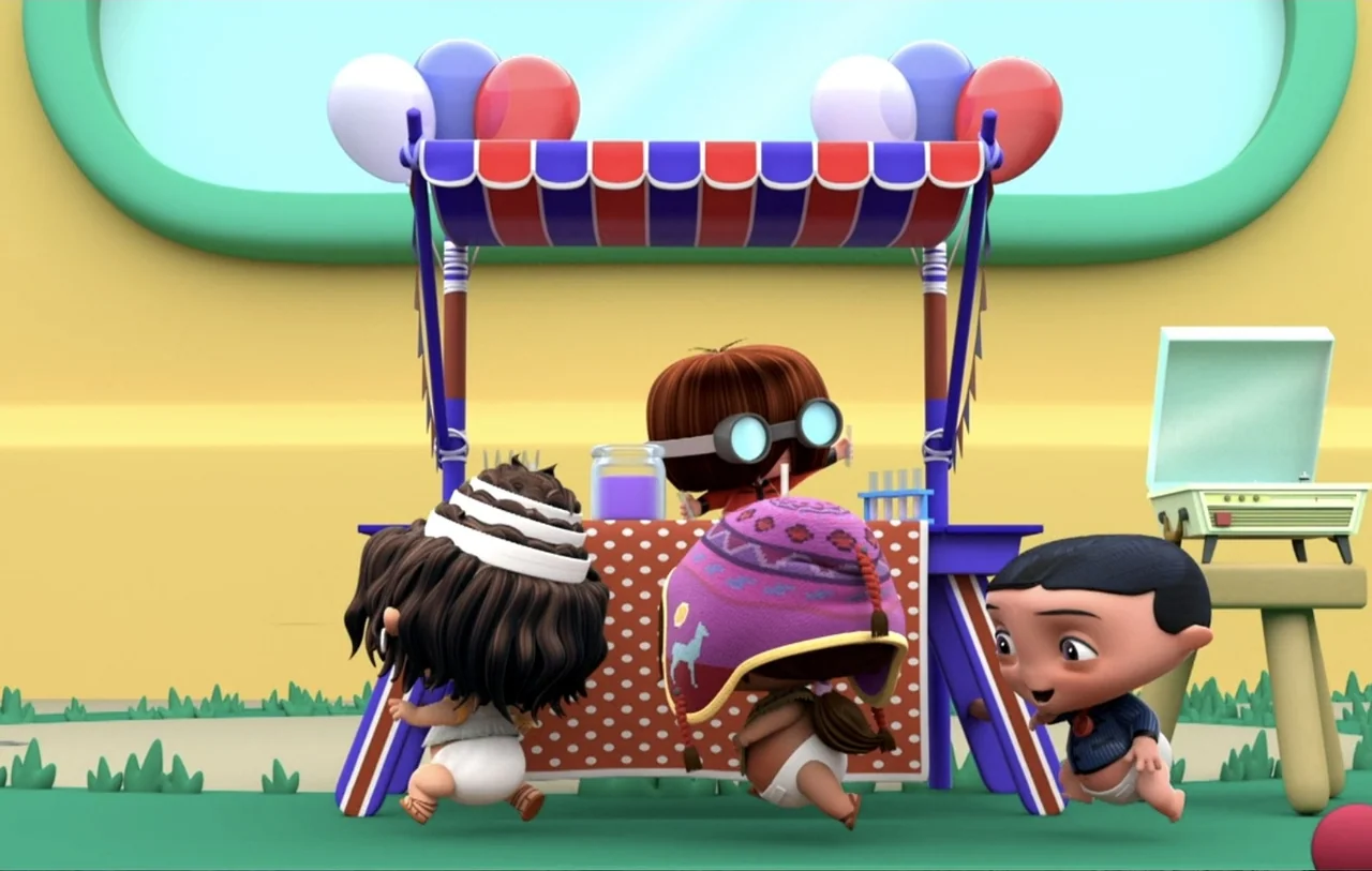 Mini Beat Power Rockers: The Movie (2022) movie still: medium — A cartoon play area features a striped booth with colorful balloons above it. Three…