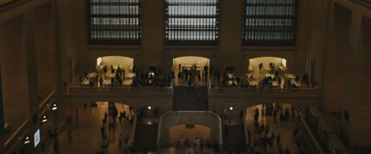 The Sun Is Also a Star (2019) movie still: establishing — A massive historic train terminal features high vaulted ceilings and multiple levels of…