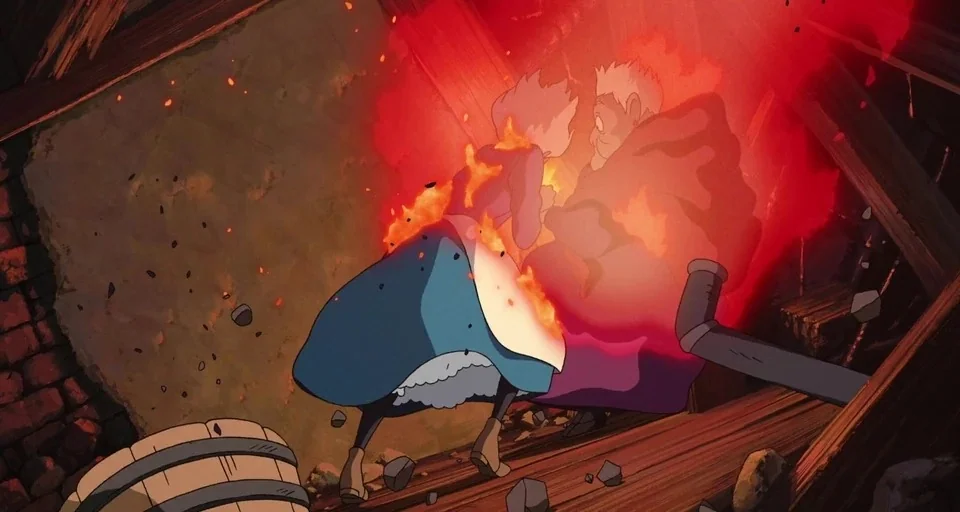 Howl’s Moving Castle (2004) movie still: medium — A dark wooden structure is collapsing with debris scattered across the floor. Two women embrace…