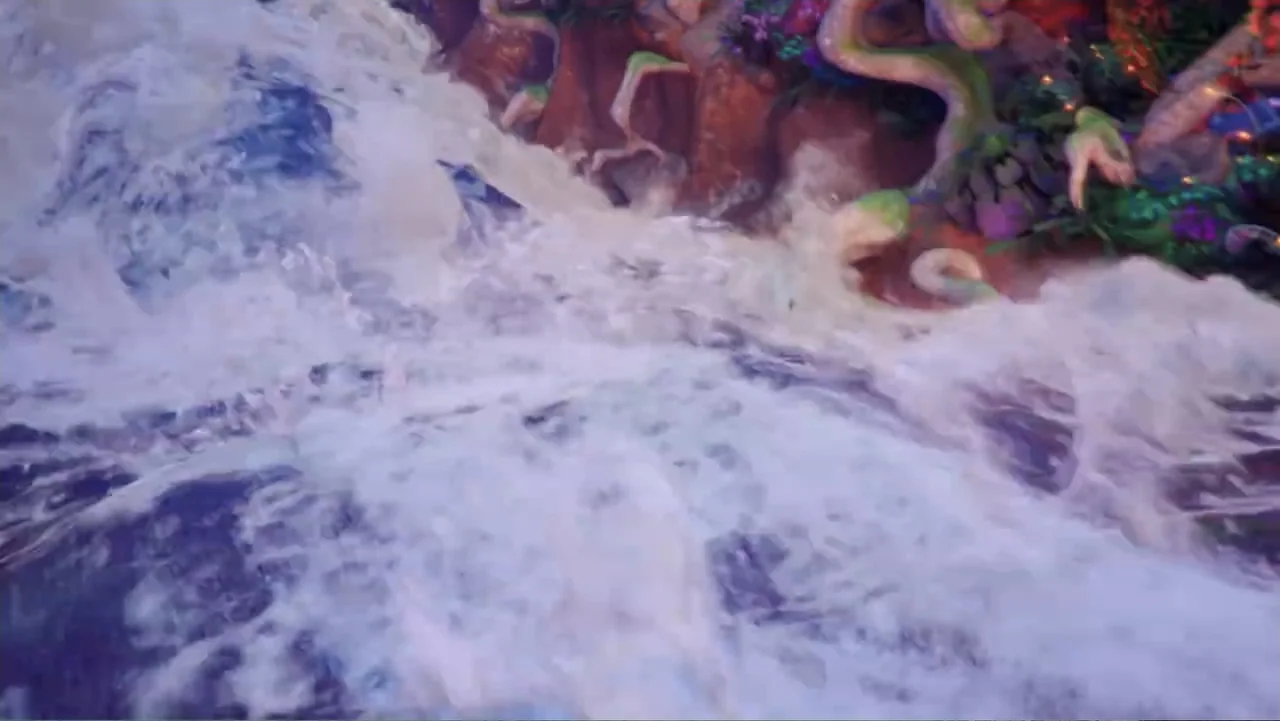 Smurfs: The Lost Village (2017) movie still: wide — A turbulent waterfall crashes against weathered brown rock ledges covered in colorful…
