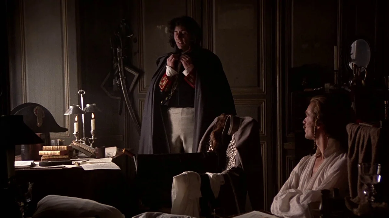 The Duellists (1977) movie still: medium — A dark, wood-paneled room furnished with desks and military artifacts from the Napoleonic era. A man…