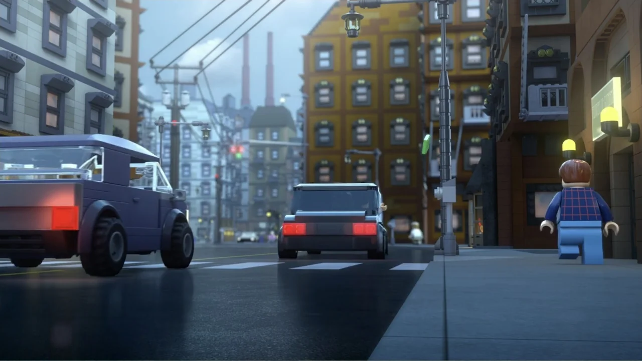 LEGO DC Batman: Family Matters (2019) movie still: medium — A street constructed from interlocking plastic bricks features multi-story buildings and…