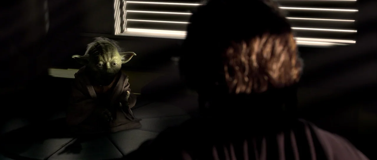 Star Wars: Episode III – Revenge of the Sith (2005) movie still: medium — A dark, spartan room features a circular floor cushion near a slatted…