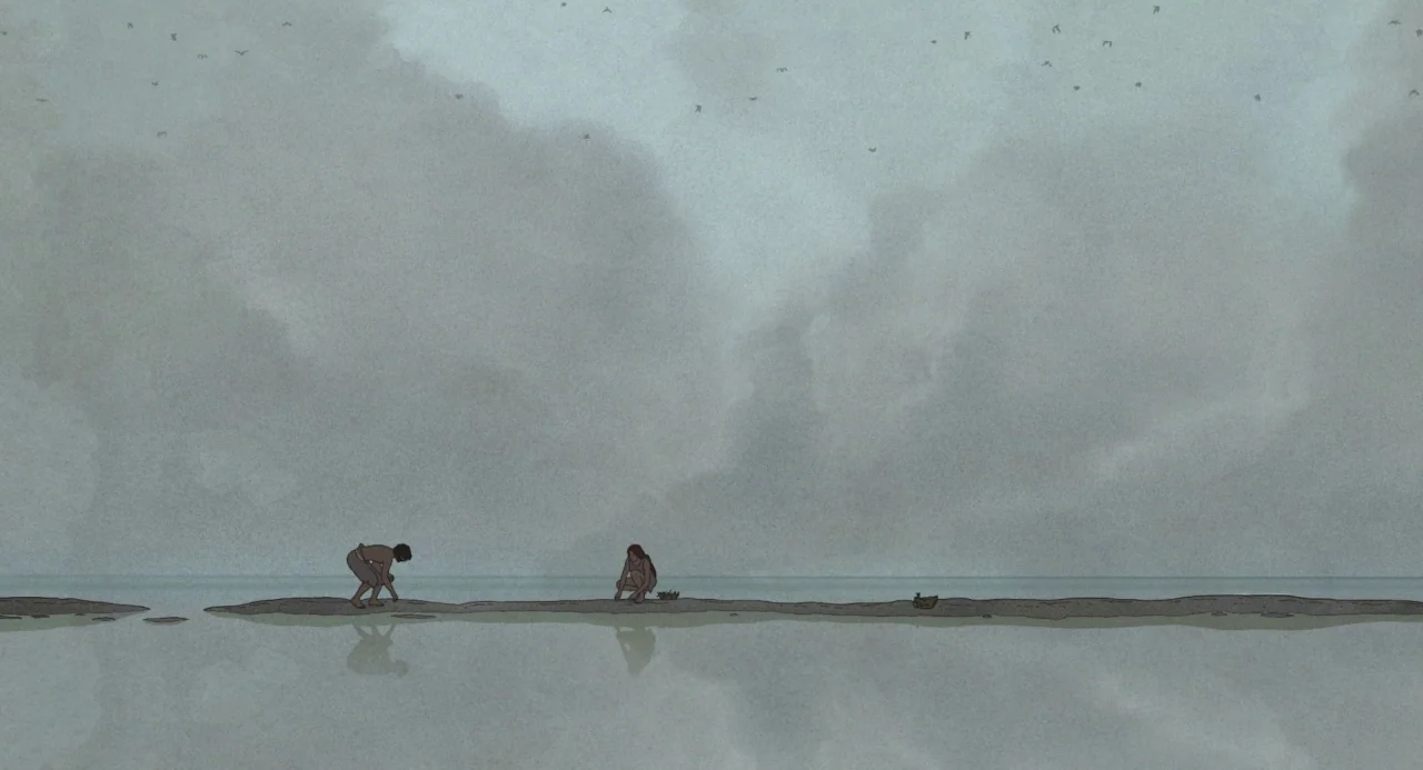 The Red Turtle (2016) movie still: wide — A long narrow sandbar stretches horizontally across a vast, calm, overcast grey ocean. Two figures crouch…