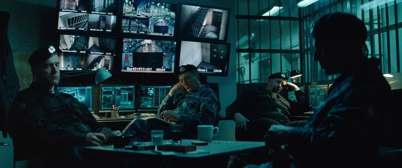 Mission: Impossible – Ghost Protocol (2011) movie still: wide — A dimly lit control center features numerous computer screens displaying…